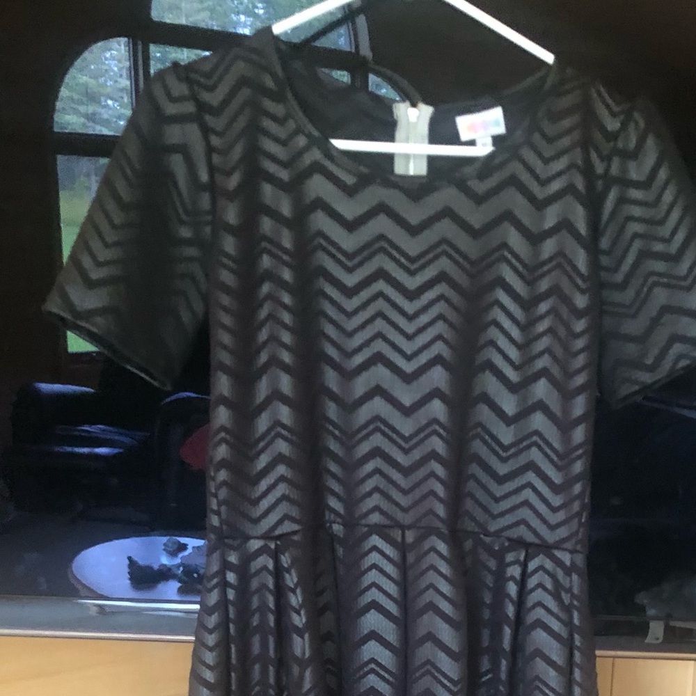 Lularoe dress. Size Medium. Has pockets! Black in color